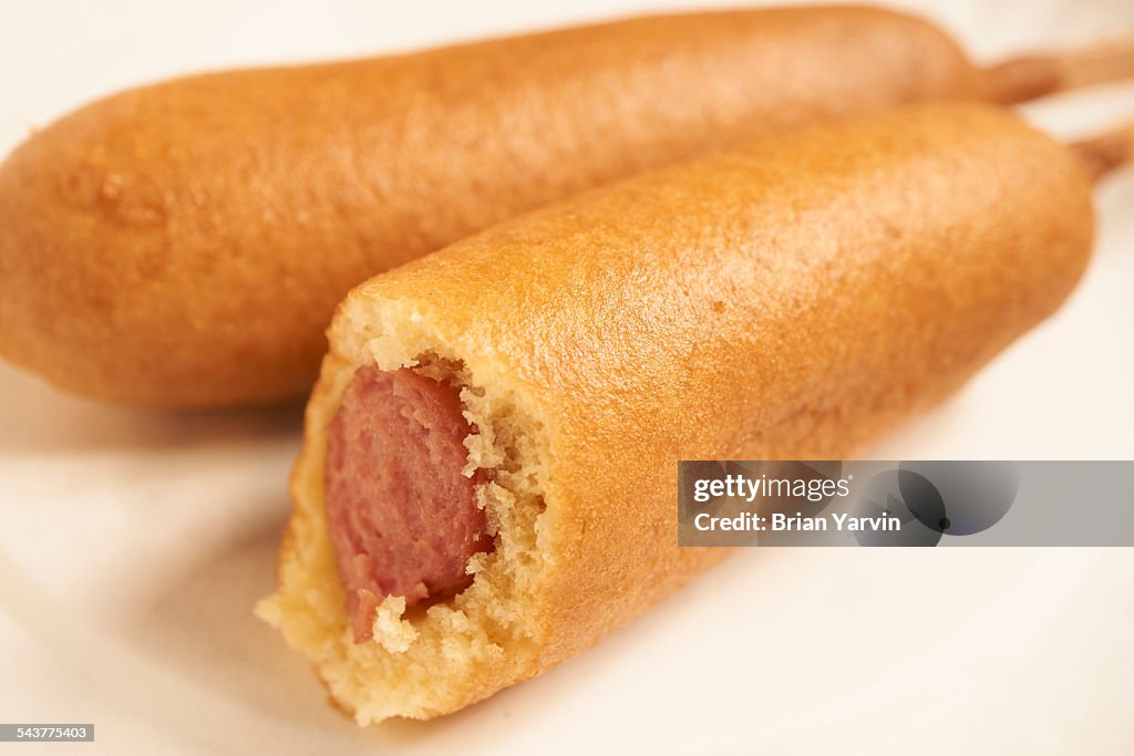 Two corn dogs