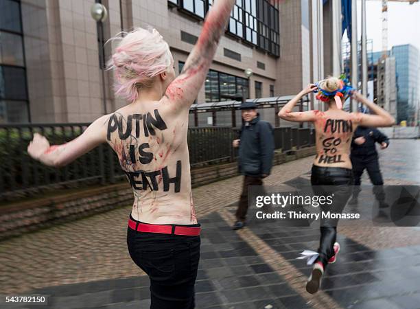 Brussels, Belgium, December 21, 2012. -- Femen activists demonstrate against Putin's visit to the EU.