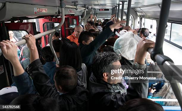 Bogotá, Republic of Colombia, August 1, 2015. -- Atmosphere photo in the TransMilenio . TransMilenio is a bus rapid transit system that serves...