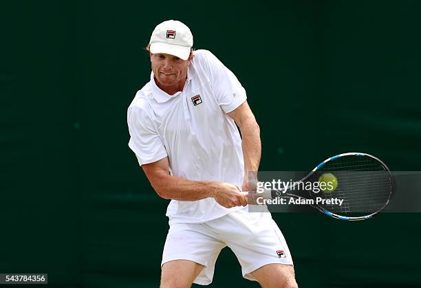 Matthew Barton of Australia plays a backhand during the Men's Singles first round match agasint Albano Olivetti of France on day four of the...
