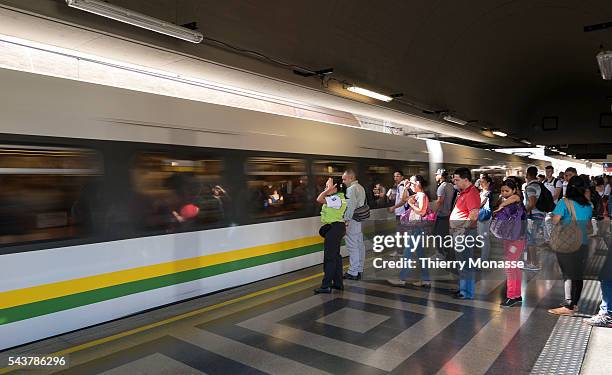 Medellín, Republic of Colombia, August 25, 2015. -- Passengers are waiting for the metro in Berrío Park metro station.