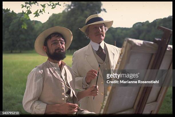 French actors Regis Royer and Claude Rich on the set of Lautrec, by French director, screenwriter and actor Roger Planchon.