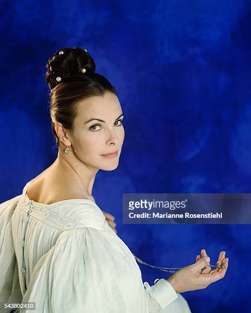 French actress Carole Bouquet wearing the dress from the 1997 French television film Le Rouge et le Noir.