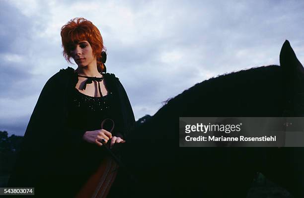 French singer Mylène Farmer on the set of her video clip "Pourvu qu'elles soient douces" directed by French composer and director Laurent Boutonnat.