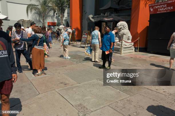 forecourt of the stars - tcl chinese theatre handprints stock pictures, royalty-free photos & images