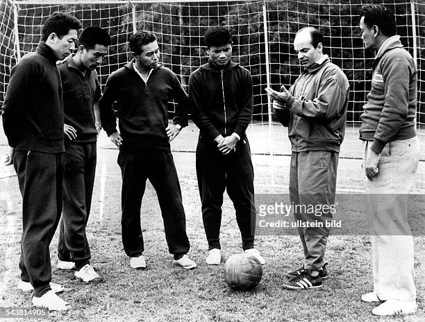 Dettmar Cramer, *-German football coach during training with japanese football players.- 1974