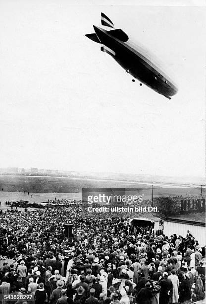 Germany Free State Prussia Berlin Berlin The rigid airship Zeppelin flying over the Berlin Tempelhof Airport - ca. 1929- Photographer: Walter Gircke-...