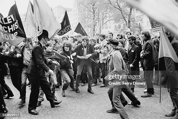 Protestors clash with police at an anti-Vietnam War demonstration in London, 1967.