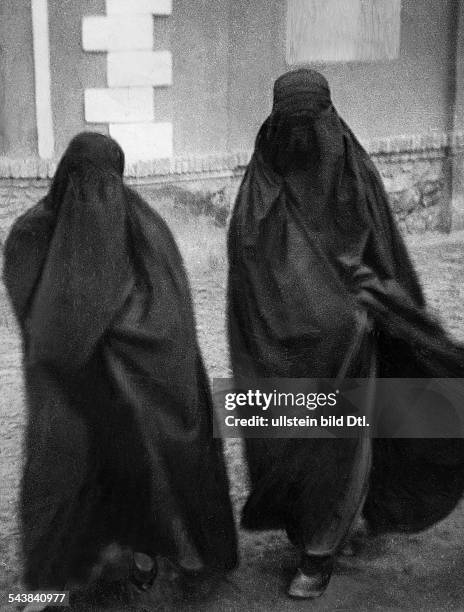 Afghanistan - : women in burqas - Photographer: Dephot - W. Bosshard- Published by: 'Berliner Illustrirte Zeitung' 49/1930Vintage property of...