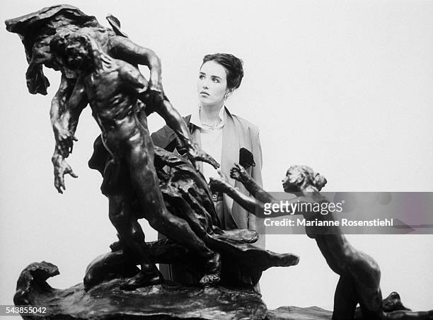 French actress Isabelle Adjani in front of a sculpture by Camille Claudel on the set of the movie based on the life of the sculptress. Adjani...