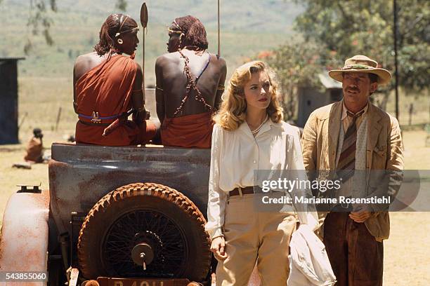 British actors Greta Scacchi and John Hurt on the set of "White Mischief" by British director, screenwriter, actor and producer Michael Radford.