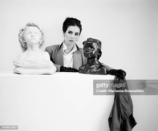French actress Isabelle Adjani in front of a sculpture by Camille Claudel on the set of the movie based on the life of the sculptress. Adjani...