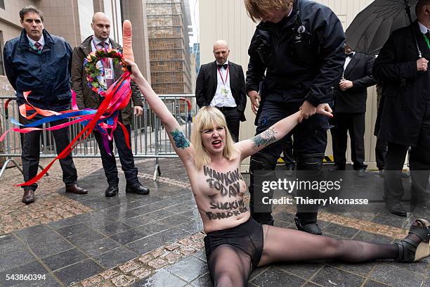 Brussels, Belgium, June 4, 2014. -- Femen activist perform during a protest ahead of the G7 Summit, in front the EU Council headquarters.