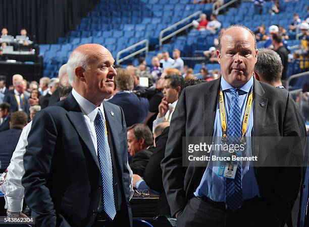 Lou Lamoriello and Mark Hunter of the Toronto Maple Leafs attend of the 2016 NHL Draft on June 24, 2016 in Buffalo, New York.