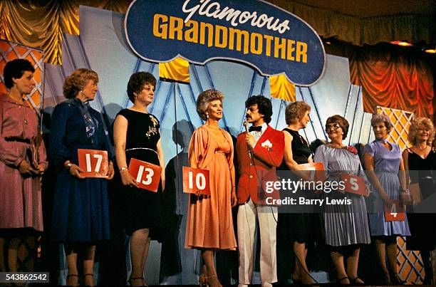 Redcoat running the "Glamourous Grandmother" competition in Butlins Holiday Camp, Skegness. Butlins Skegness is a holiday camp located in Ingoldmells...