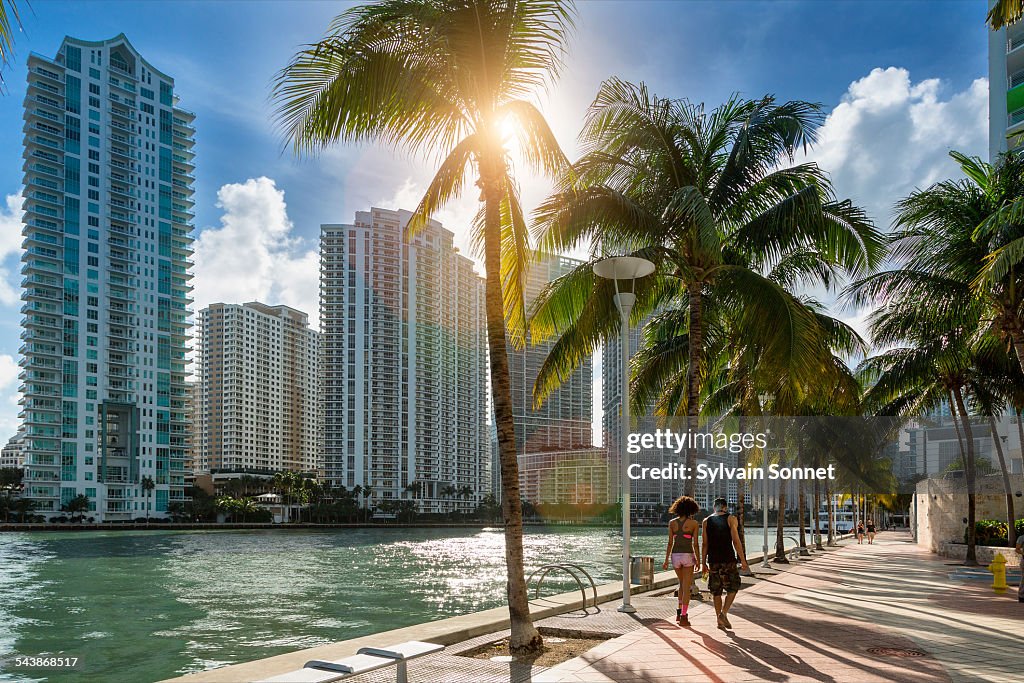 Downtown Miami, people walking along Miami River