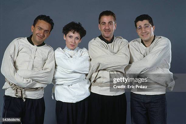 Dominque Farrugia, Chantal Lauby, Bruno Carette, and Alain Chabat, members of French comedy troupe "Les Nuls", on Canal Plus.