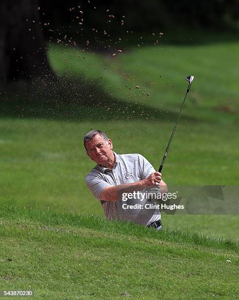 Adrian Drabble of Silloth on Solway Golf Club plays out of a bunker during the PGA National Pro-Am North Qualifier at Dunham Forest Golf Club on June...