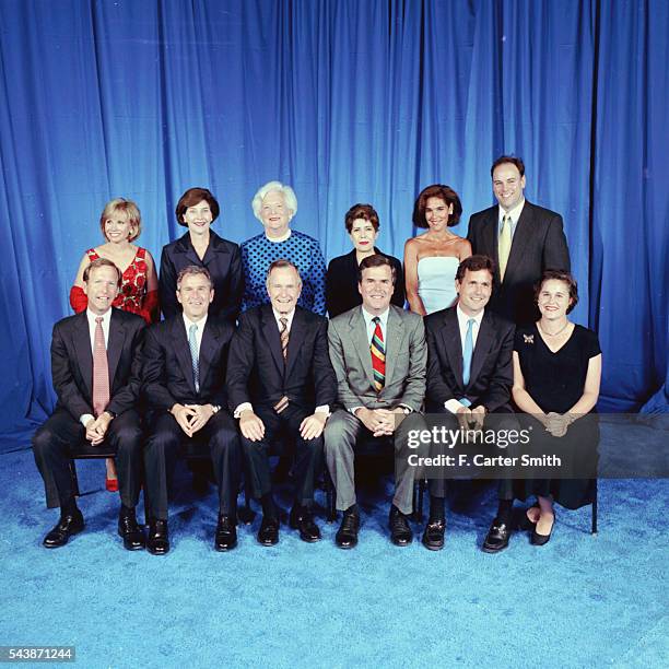 George and Barbara Bush surrounded by their children and grandchildren.