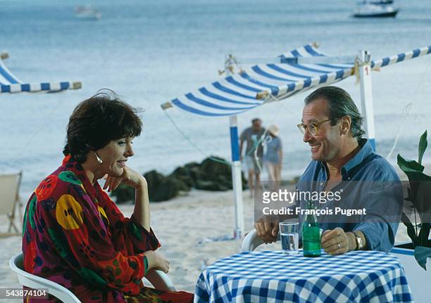 French actors Anny Duperey and Bernard Le Coq on the set of the television show "Une famille formidable", directed by Joel Santoni.