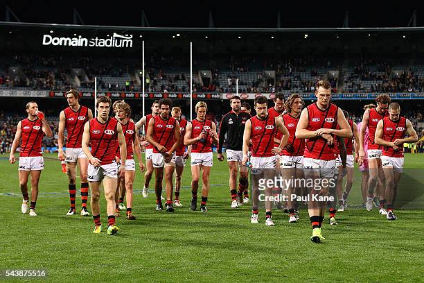 Brendon Goddard of the Bombers leads his team from the field after being defeated during the round 15 AFL match between the West Coast Eagles and the...