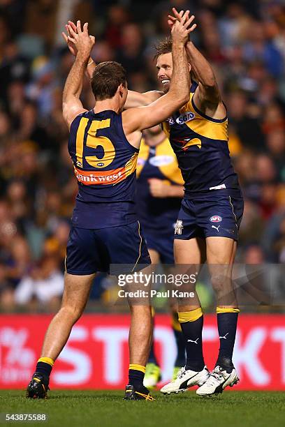 Mark LeCras of the Eagles celebrates a goal with Jamie Cripps during the round 15 AFL match between the West Coast Eagles and the Essendon Bombers at...