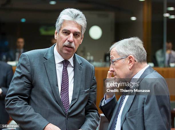 Brussels, Belgium, November 7, 2014. -- Austrian Finance Minister Doctor Hans Jörg SCHELLING is talking with the Chief Executive Officer of the...