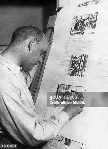 Preparations for filming , Creation of a storyboard: Production designer Fritz Maurischat at work - ca. 1932- Photographer: Weltrundschau, Erich...