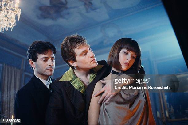 French actor Francis Huster, Turkish-born French actor Tcheky Karyo and French actress Sophie Marceau on the set of L'Amour Braque, by her husband,...