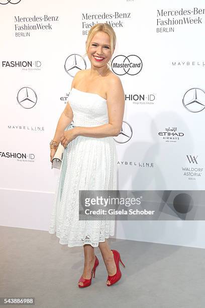 Nova Meierhenrich wearing a white dress by Lena Hoschek during the Lena Hoschek show during the Mercedes-Benz Fashion Week Berlin Spring/Summer 2017...