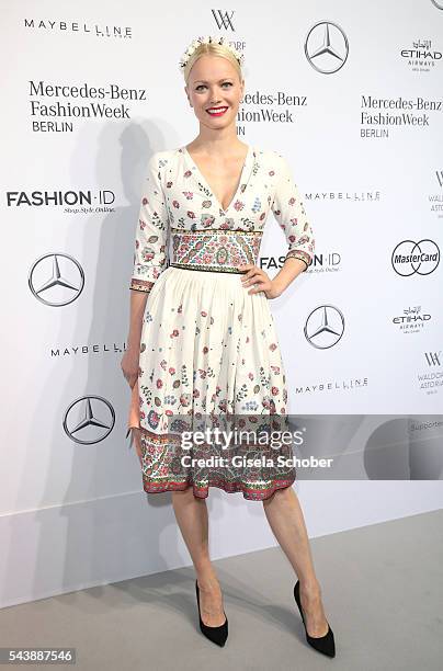 Franziska Knuppe wearing a dress by Lena Hoschek during the Lena Hoschek show during the Mercedes-Benz Fashion Week Berlin Spring/Summer 2017 at...