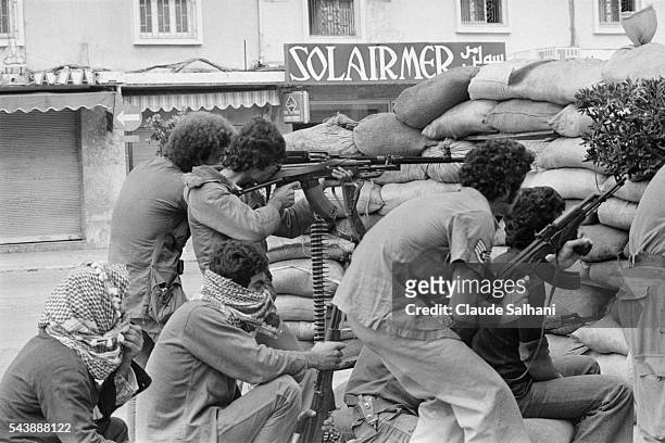 Palestinian combatants maintain their positions in Beirut as they await the results of political negotiations between parties.