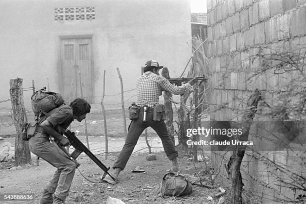 Farabundo Marti National Liberation Front guerrillas during an attack at Santa Rosa de Lima. | Location: Santa Rosa De Lima, El Salvador.