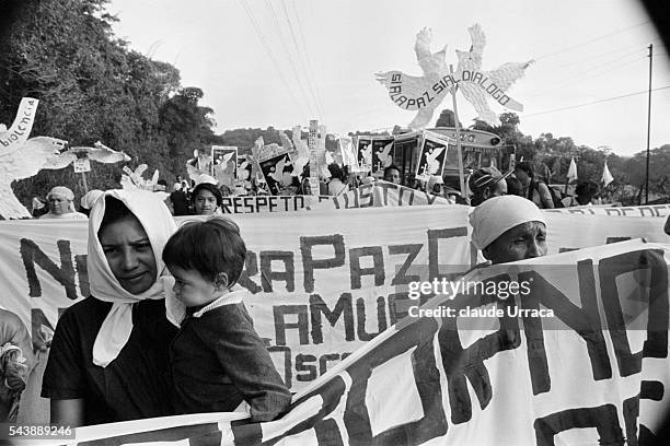 Mothers of children who went missing during the civil war demonstrate during a rally of Jose Napoleon Duarte. | Location: Ayagualo, El Salvador.