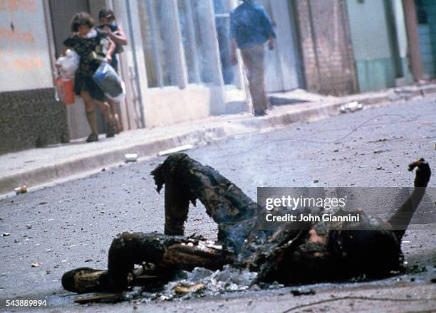 Corpse in the street of Esteli during the fighting between Sandinistas and the Guardia.