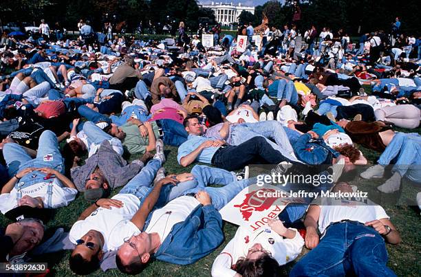 Protest in front of the White House. ACT UP activists stage a die-in on the lawn in front of the Capitol building.