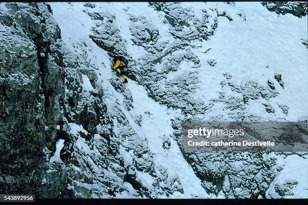French rock climber Catherine Destivelle climbs the Eiger , in the Bernese Alps in Switzerland.