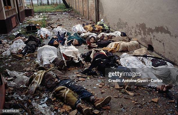 Corpses of civilians lie in the deserted streets of Vukovar after a three-month battle between the Croatian armed forces and the Yugoslavian Federal...