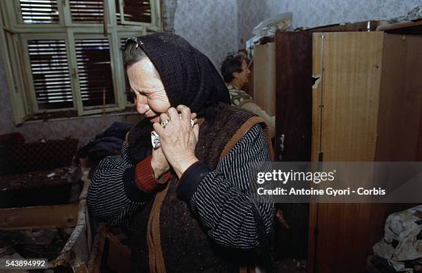 An elderly Croatian woman who survived the three-month battle between the Croatian armed forces and the Yugoslavian Federal Army in Vukovar mourns in...