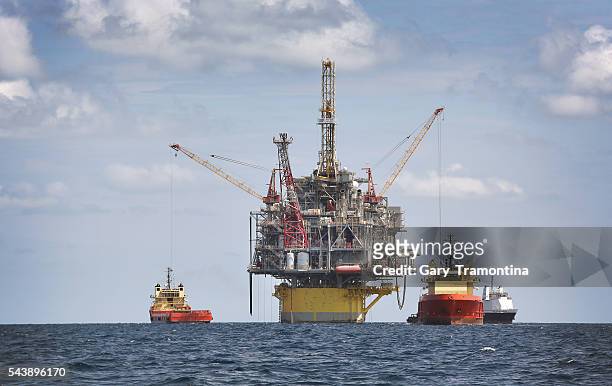In about 8,000 feet of water, Shell's Perdido offshore drilling and production platform is the world's deepest offshore rig. Shown in this 2012...