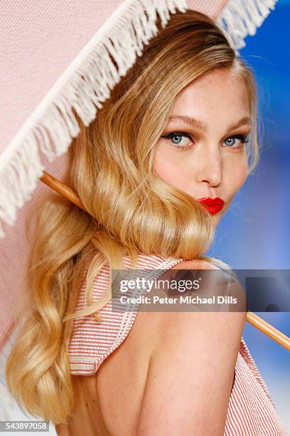 Model walks the runway at the Lena Hoschek show during the Mercedes-Benz Fashion Week Berlin Spring/Summer 2017 at Erika Hess Eisstadion on June 30,...