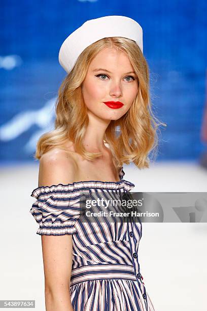 Model walks the runway at the Lena Hoschek show during the Mercedes-Benz Fashion Week Berlin Spring/Summer 2017 at Erika Hess Eisstadion on June 30,...