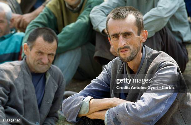 Emaciated Bosnian prisoners of war are detained at the Manjaca concentration camp during the Yugoslavian Civil War. The Serb camp, which detained...