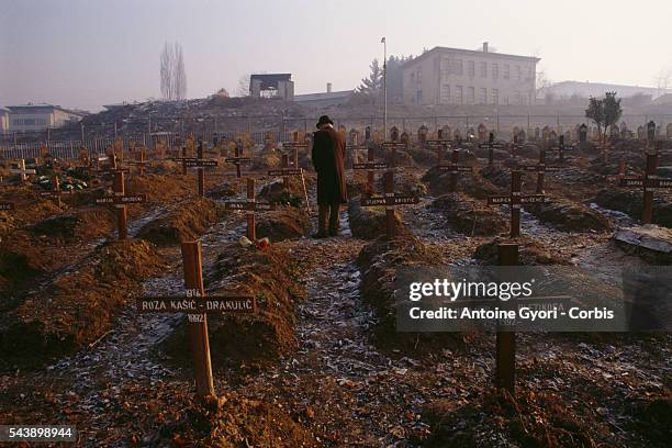 Man at Sarajevo's Lions Cemetery mourns the death of a relative who was killed during the city's besiege during the Yugoslavian Civil War. In March...