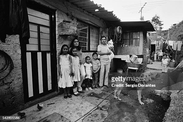 Family outside a favella.