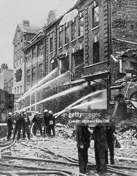 Britain during... / Air War: Battle of Britain Bomb raid against Birmingham: A heavily damaged maintenance plant December 19401940 No further...