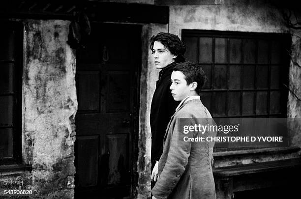 American actors Johnny Depp and Marc Pickering on the set of the film Sleepy Hollow, directed by Tim Burton.