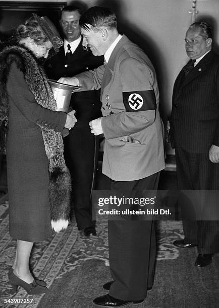 Goebbels, Magda - Wife of J. Goebbels, Germany*11.11..1945+Adolf Hitler and Magda Goebbels donating money on the day of national solidarity -...