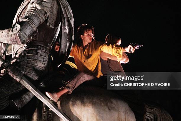 French actors Juliette Binoche and Denis Lavant on the set of the film Les Amants du Pont Neuf , directed by Leox Carax.