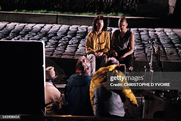 French actors Juliette Binoche and Denis Lavant on the set of the film Les Amants du Pont Neuf , directed by Leox Carax.